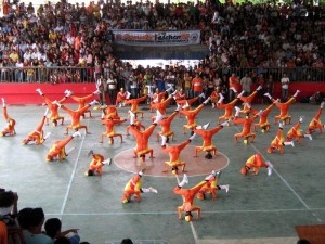 Orange Dancers doing headspins