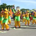 Street dancers clad in gold
