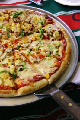 Giacomino's healthy and cheesy Veggie pizza