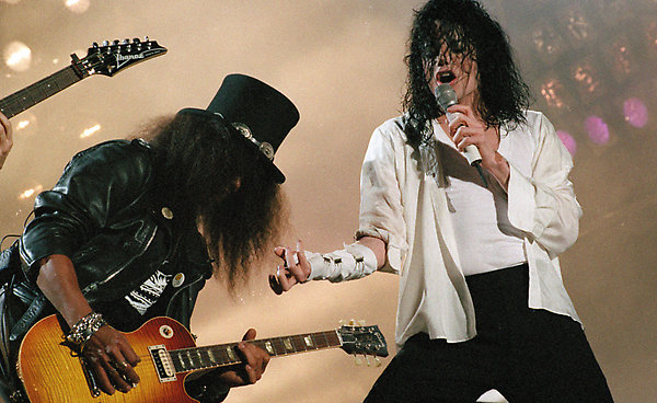 Michael Jackson (with Slash here) was given a Dance Tribute by Cebu Inmates (AP Photo/Tsugufumi Matsumoto}